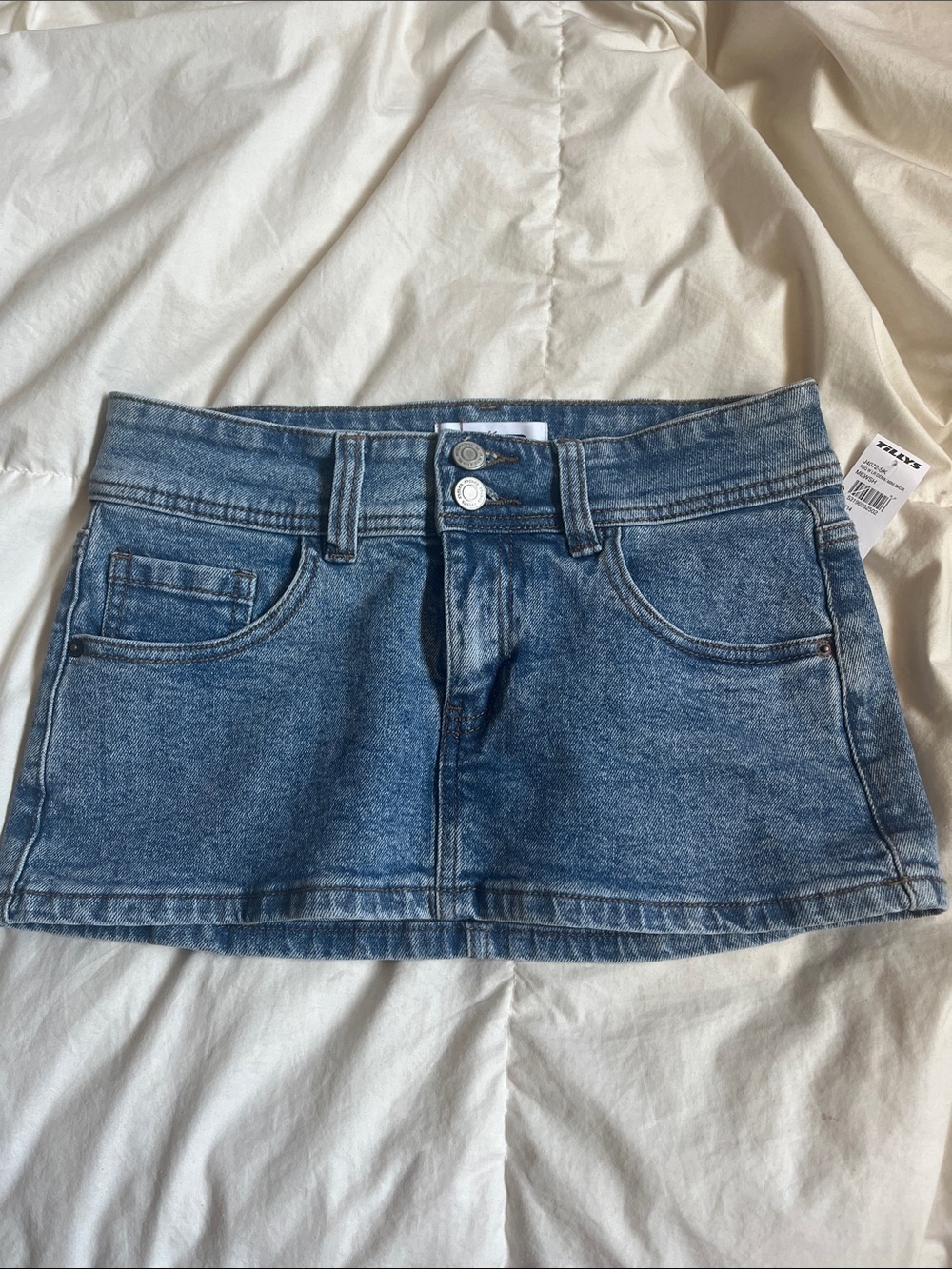 Blue denim skirt with built in shorts.